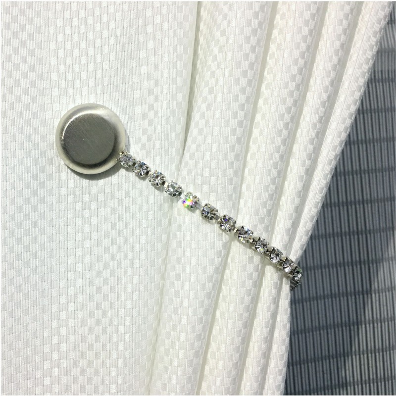Calamita per tende con cristalli Swarovski (in ottone e acciaio, diverse finiture) Calamita per tende con cristalli Swarovski (in ottone e acciaio, diverse finiture)